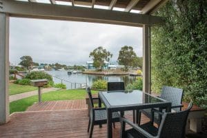 Outdoor deck area - Captains Cove Waterfront Apartments