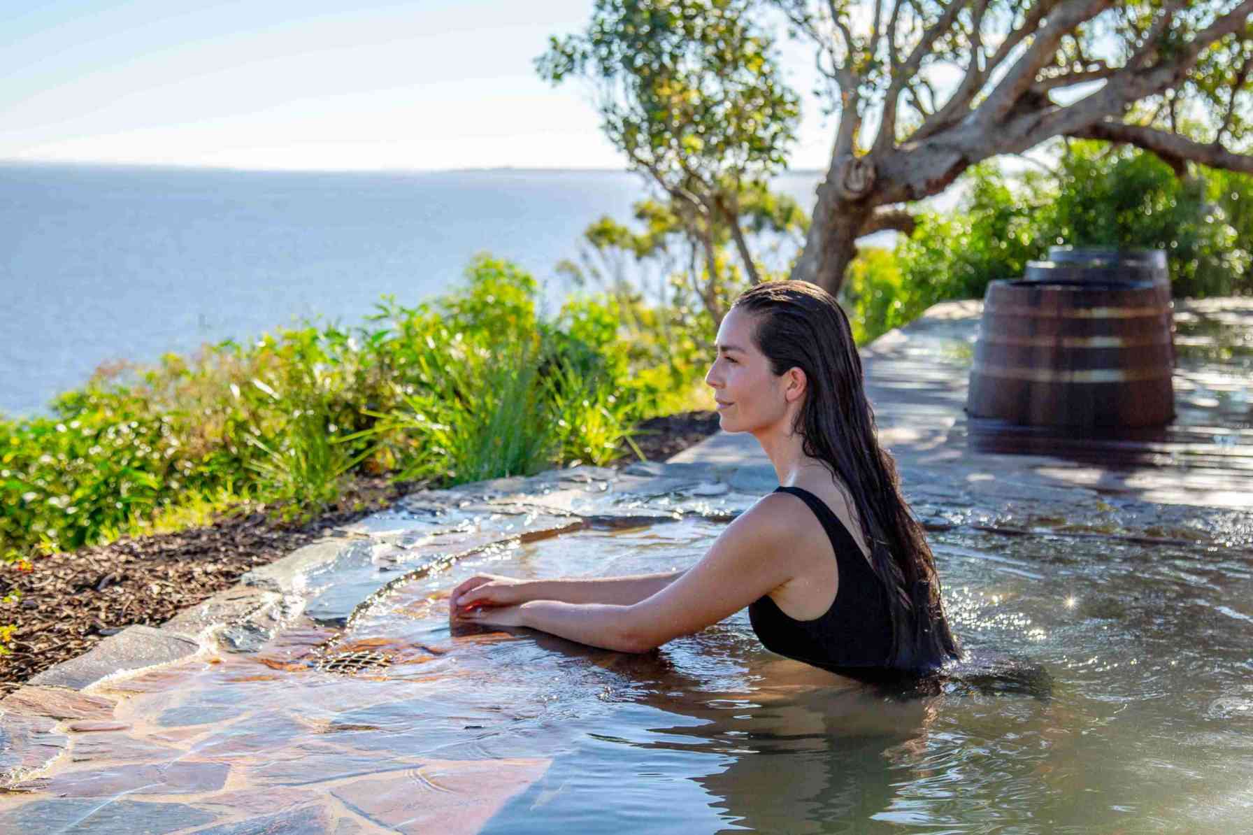 Woman at Star Gazing Pool at Metung Hot Springs